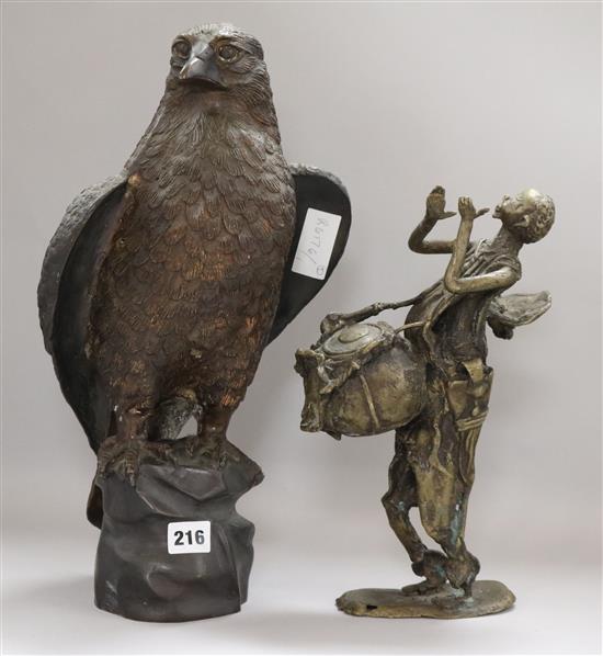 A bronze model of an eagle and a bronze figure